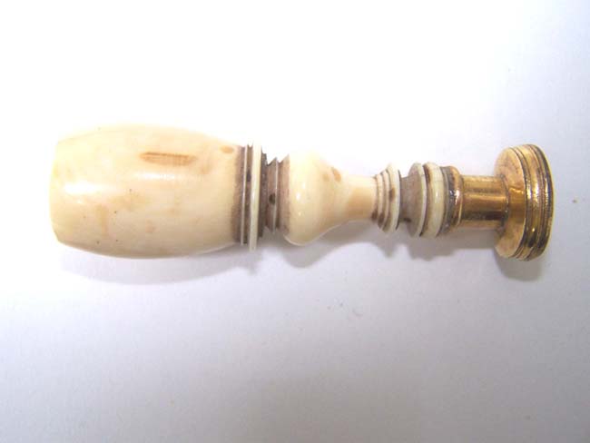 A rare late 17th century Gilt-Brass Mounted Ivory Desk Seal